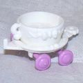 G1 petite white teacup car with purple wheels.jpg