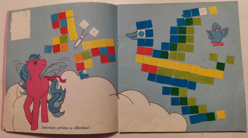 File:69 Finnish G1 Sticker Book Tarrakirja Above the Clouds Pilvien paalla Page 2 and 3 Photo Credit PipsaP.jpg